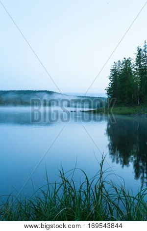 Landscape on the Bahta river. Foggy morning. Eastern Siberia, Russia