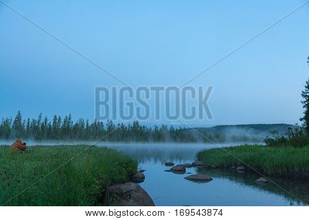 Foggy morning on the river. Eastern Siberia, Russia