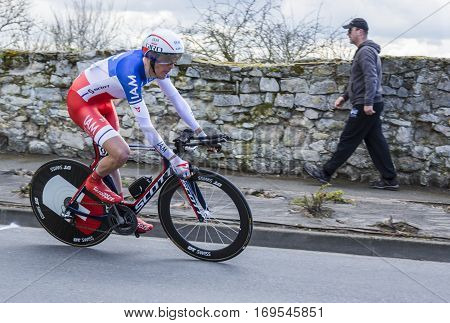 Conflans-Sainte-HonorineFrance-March 62016: The French cyclist Jerome Coppel of IAM Cycling Team riding during the prologue stage of Paris-Nice 2016.