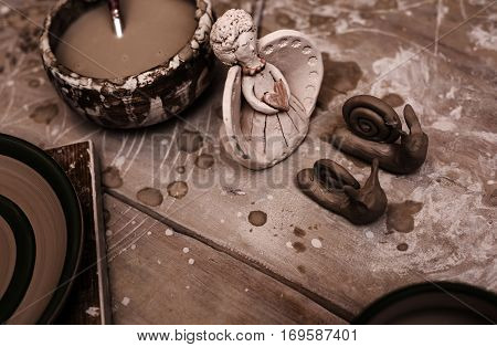 Creative studio potter, Handmade objects on a wooden table
