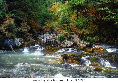 Mountain stream with clean cold water originating from the glaciers on the mountain tops.