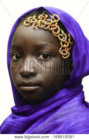Gorgeous African Schoolgirl Posing Outdoors with a Violet Head Scarf