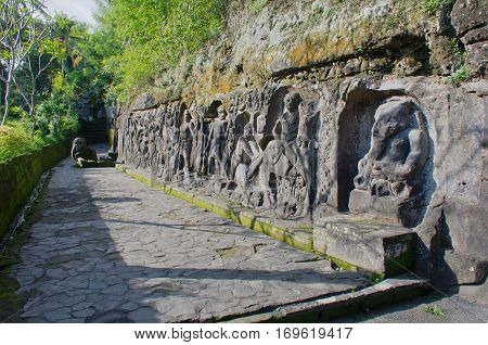 Dating to the 14th century the rock carvings at Yeh Pulu are set beside rice paddies