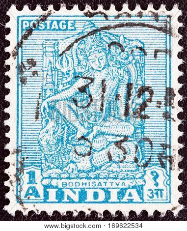 INDIA - CIRCA 1949: A stamp printed in India shows Bodhisattva with right arm outstretched, circa 1949.