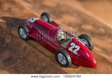 Red racing car of the Nuvolari era