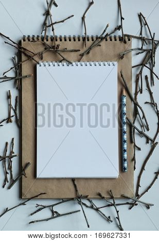 Winter art. Creative decoration. Madern table. Notebook