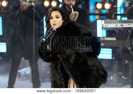 NEW YORK-DEC 31: Recording artist Demi Lovato performs during Dick Clark's New Year's Rockin' Eve at Times Square on December 31, 2015 in New York City.