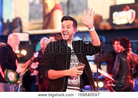 NEW YORK-DEC 31: Recording artist Luke Bryan performs during Dick Clark's New Year's Rockin' Eve at Times Square on December 31, 2015 in New York City.