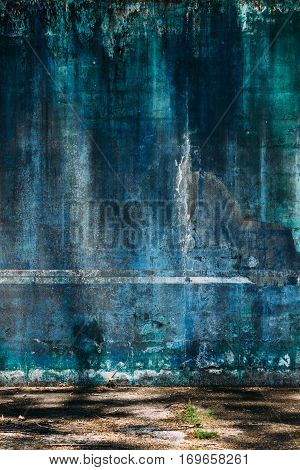 grunge wall background vintage style , green and blue colors .