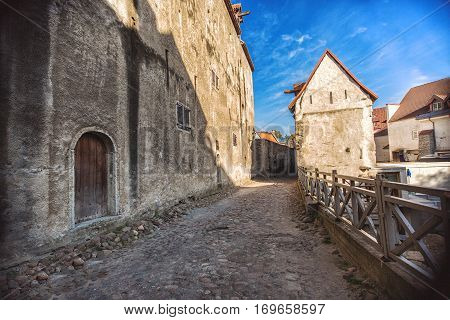 Medieval street of old town Tallinn in sunny day