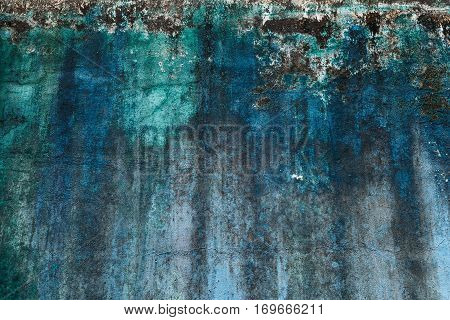 grunge wall background vintage style , green and blue colors .