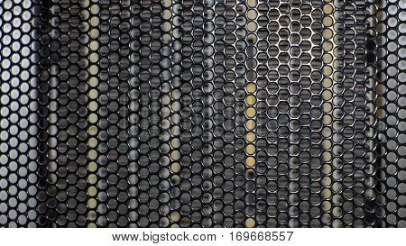 A metal grid. Abstract background texture with circular holes