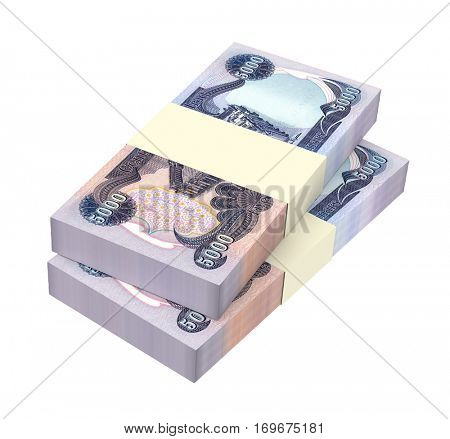 Iraqi dinars bills isolated on white background. 3D illustration.