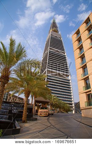 RIYADH - AUGUST 22: Sunset light at Al Faisaliah tower facade on August 22, 2016 in Riyadh, Saudi Arabia. Al Faisaliah towers is a luxury hotel and the most distinctive skyscraper in Saudi Arabia