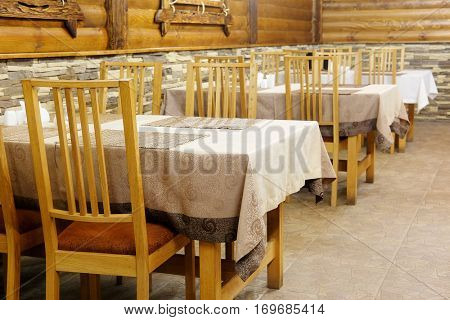 Interior of a cafe in a wooden house