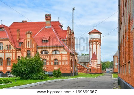 Old German houses and water tower in East Prussia.