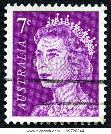AUSTRALIA - CIRCA 1970: A used 7 cent postage stamp from Australia depicting a portrait of Queen Elizabeth II circa 1970.
