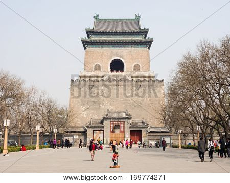 Beijing, China - March 26, 2015: People Strolling On A Street Leading To Bell Tower, A Historic Land