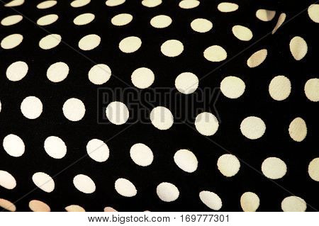 The poka dot black and white color