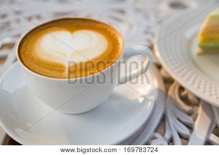 coffee cup and latte art in holiday