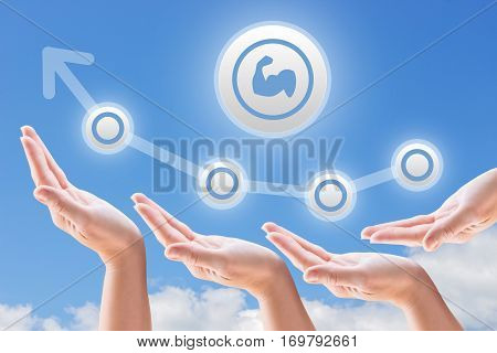 hands support the growth and promotion on the background of sky and clouds exercise