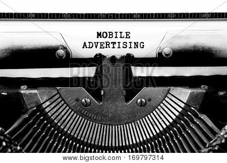 MOBILE ADVERTISING Typed Words On a Vintage Typewriter Conceptual