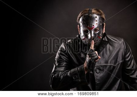 Serial maniac in hockey show do not talk sign