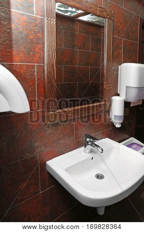 Interior of lavatory in modern cafe