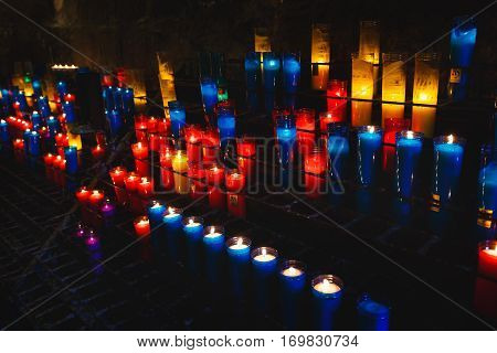 Barcelona Spain - January 06 2017: Candles for prayers in ther church of the Benedictine monastery of Santa Maria de Montserrat