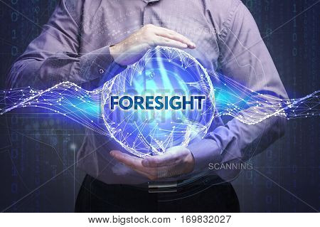 Business, Technology, Internet And Network Concept. Young Businessman Shows The Word: Foresight