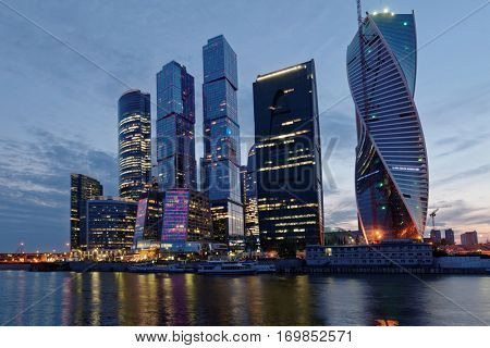MOSCOW, RUSSIA - JUNE 30, 2014: Moscow international business center Moscow City in evening. The construction started in 1995, costs for the present about $12 billions, and have to be finished in 2017