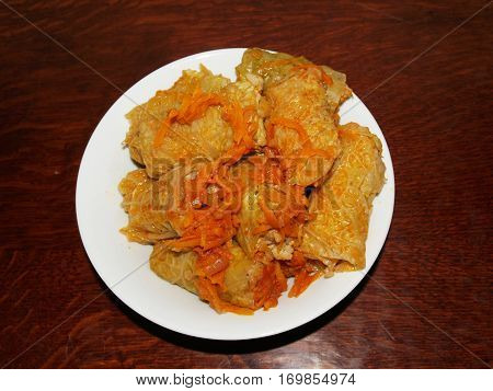 stuffed cabbage is a dish of stuffing wrapped in cabbage leaves.