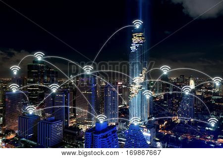 Smart city and wireless communication network business district with office building abstract image visual internet of things concept