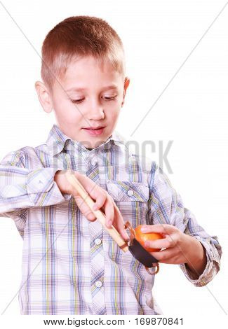 Young Boy Use Sling Shot Shoot Mandarine.
