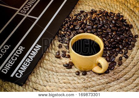 Cup of coffee with slate on a jute rope.