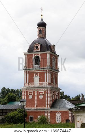 Red bell tower of Goritsky monastery in Pereslavl-Zalessky, Russia