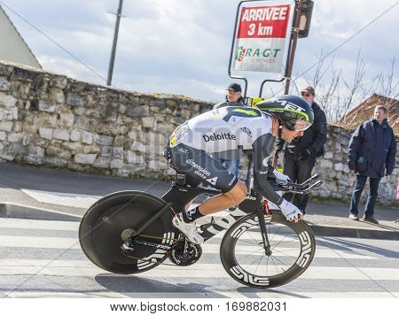 Conflans-Sainte-HonorineFrance-March 62016: The South African cyclist Jacques Janse van Rensburg of Dimension Data Team riding during the prologue stage of Paris-Nice 2016.