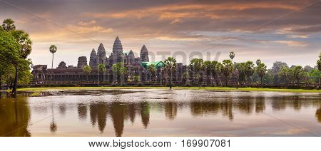 Angkor Wat temple with reflecting in water. Panoramic view