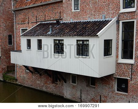 White kitchen above the water in Appingedam