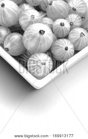 Close up of goosberries on white background