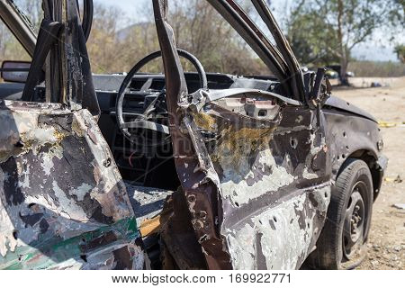 simulated wrecked car evidence from bomb in car bomb investigation training course
