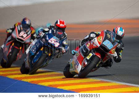 VALENCIA, SPAIN - NOV 13: 23 Schrotter, 54 Pasini, 94 Folger in Moto2 Race during Motogp Grand Prix of the Comunidad Valencia on November 13, 2016 in Valencia, Spain.
