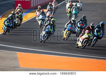 VALENCIA, SPAIN - NOV 13: Moto3 race during Motogp Grand Prix of the Comunidad Valencia on November 13, 2016 in Valencia, Spain.