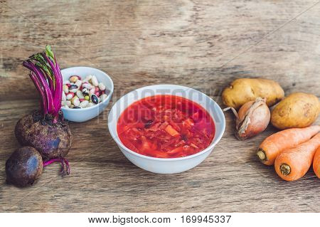 Traditional Ukrainian Russian Vegetable Borscht Soup On The Old Wooden Background