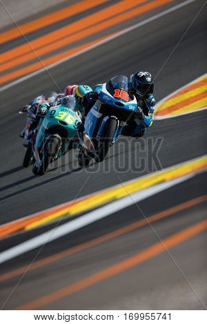 VALENCIA, SPAIN - NOV 11: 16 Migno, 36 Mir during Moto3 practice in Motogp Grand Prix of the Comunidad Valencia on November 11, 2016 in Valencia, Spain.