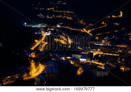 Night bird's-eye view on mountain inhabited locality in Andorra
