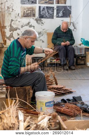 Camacha, Madeira, Portugal - April 19, 2018: A Basket Weaver At Work In The Factory Shop In Camacha 