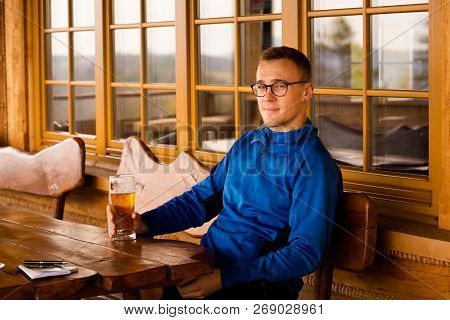 Young Caucasian Tourist With Cold Beer  Taken In Polish Beskidy Mountains, Grabowa.