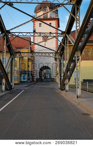 Leoben, Styria, Austria - August 06, 2018: Bridge Over The Mur River In Leoben, In The Background Th