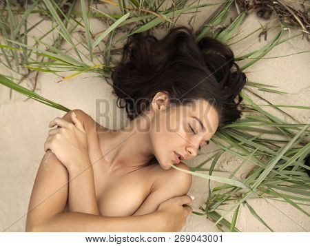 Free Happy Woman On The Beach Enjoying Nature Of Tropical Island. Natural Beauty Girl Outdoor. Enjoy